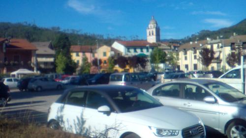 a group of cars parked in a parking lot at Relax Brugnato in Brugnato
