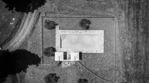 an overhead view of a building on the street at Agriturismo La Quiete in Volterra