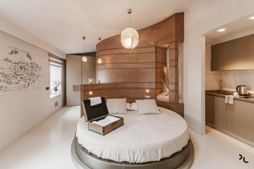 Letto o letti in una camera di La Residenza del Monaco bianco