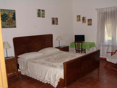 Katil atau katil-katil dalam bilik di Agriturismo Cà Rossano