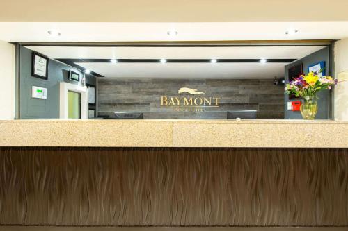 a bar with a sign that says bar mom at Baymont by Wyndham Louisville East in Louisville
