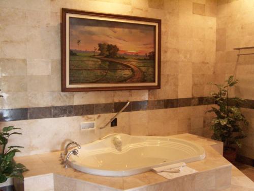 Vannituba majutusasutuses Puri Asri Hotel & Resort