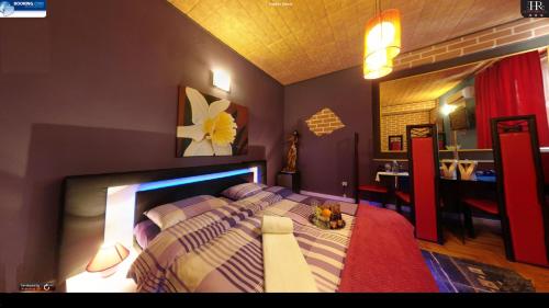 Tempat tidur dalam kamar di Rimini Club Inn & Suites