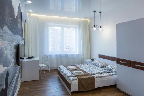 Llit o llits en una habitació de Apartments ODIN in city centre