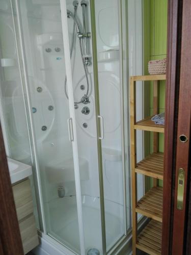 a shower with a glass door in a bathroom at I Sogni di Morfeo in Termoli