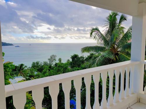a balcony with a view of the ocean at Horizon view in Victoria