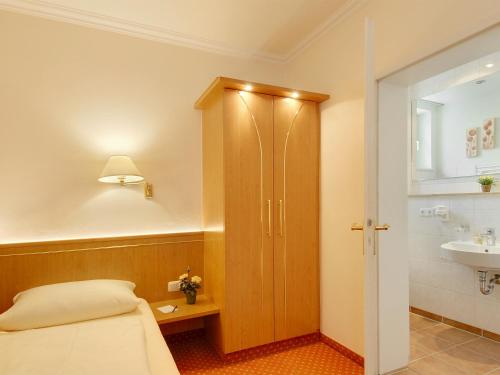 Koupelna v ubytování Hotel Kriemhild am Hirschgarten