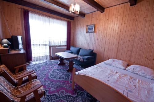 Postel nebo postele na pokoji v ubytování Willa Asia
