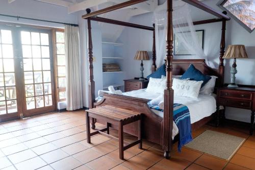 A bed or beds in a room at St Lucia Eco Lodge