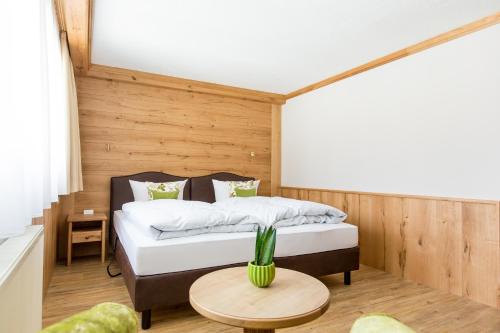 Ένα ή περισσότερα κρεβάτια σε δωμάτιο στο Hotel Gerbe