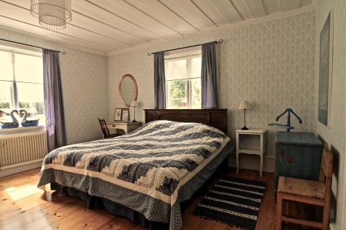 Ένα ή περισσότερα κρεβάτια σε δωμάτιο στο Sweden B&B "Lundbergs"