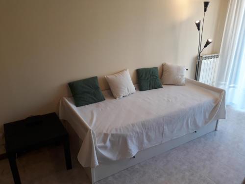 Ένα ή περισσότερα κρεβάτια σε δωμάτιο στο Le Torri Apartments
