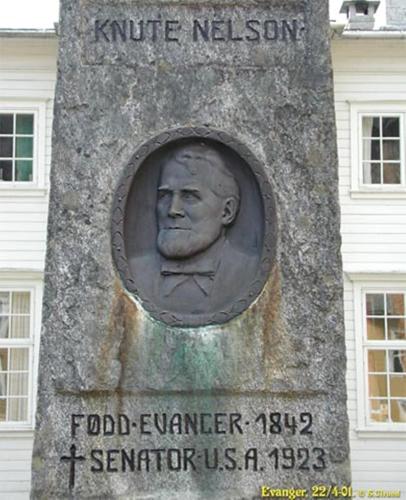a statue of a man on the side of a monument at Rongahuset BnB in Evanger