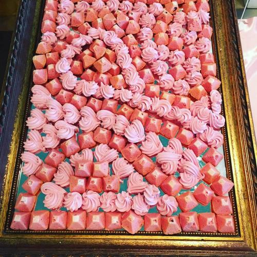 a picture of a cake with pink and white cupcakes at Hotel Lady Mary in Milano Marittima