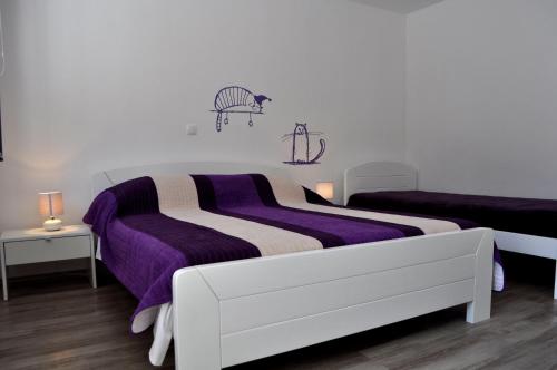 Postel nebo postele na pokoji v ubytování BAY SAŠĆICA