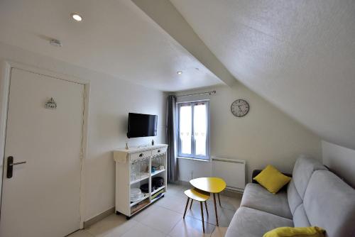 Μια τηλεόραση ή/και κέντρο ψυχαγωγίας στο Appartement "Plaisir iodé" - 50m Front de Mer