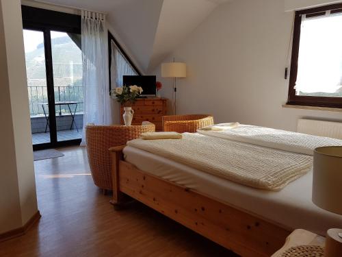 En eller flere senge i et værelse på Haus Grünewald