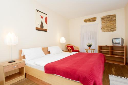 Postel nebo postele na pokoji v ubytování Hotel Stary Pivovar