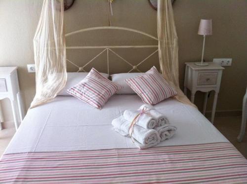 Ένα ή περισσότερα κρεβάτια σε δωμάτιο στο Πανσιόν Μαϊστράλι