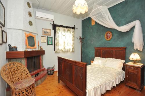 Postel nebo postele na pokoji v ubytování Corfu Green Paradise