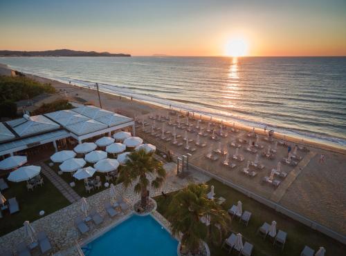 an aerial view of a wedding at the beach at Acharavi Beach Hotel in Acharavi