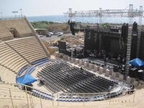 an empty amphitheater with a stage and a crowd at Villa Alice Caesarea in Caesarea