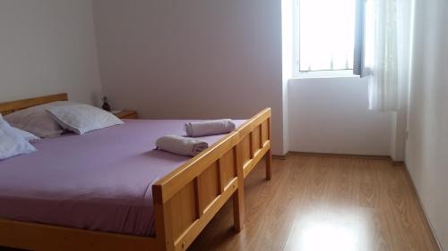 A bed or beds in a room at Holiday Home Rubinić