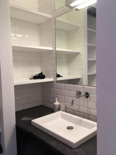 Un baño de Gachard