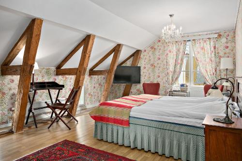 Katil atau katil-katil dalam bilik di Toftaholm Herrgård