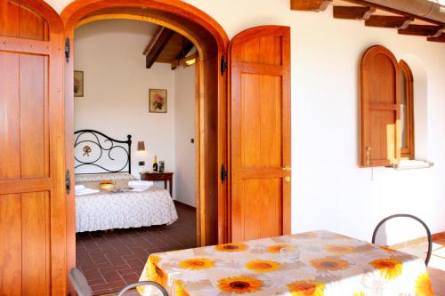 Giường trong phòng chung tại La Vecchia Fornace