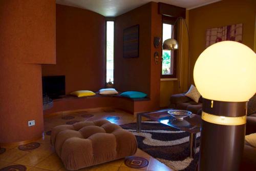 a living room with a couch and a table at Villa Gione in Verona