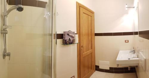 a bathroom with a shower and a sink at Casa Del Sole in Soverato Marina