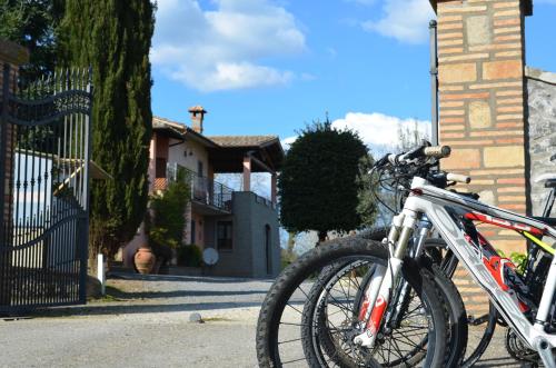 a pair of bikes parked next to a house at Bed and Breakfast Bike in Bagnoregio
