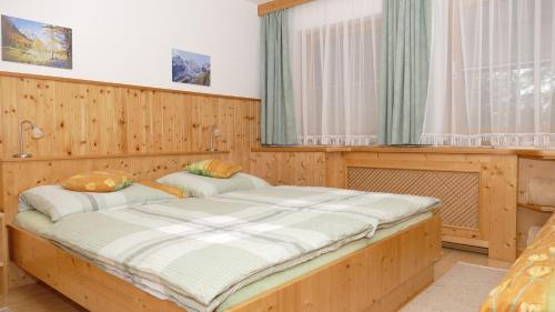Postel nebo postele na pokoji v ubytování Ferienwohnung Moser