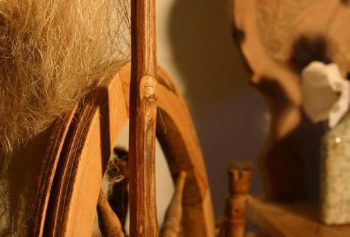 a close up of a wooden chair with blonde hair at Fleckhof in Neustift im Stubaital