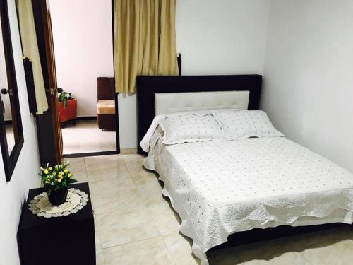 Łóżko lub łóżka w pokoju w obiekcie Hotel Mirador de Santa Bárbara