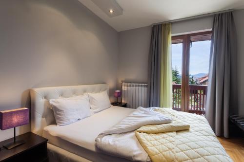 Llit o llits en una habitació de Vila Barović and Spa