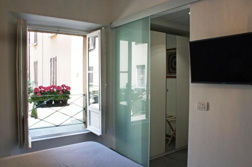 TV a/nebo společenská místnost v ubytování La Marina di Milano