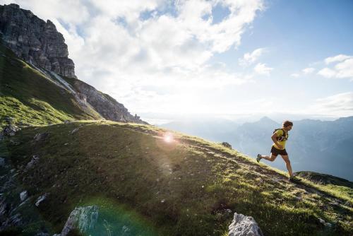 a man running on the side of a mountain at Haus Elisabeth in Neustift im Stubaital
