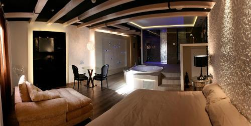 a living room with a couch and a table at Kadrit Hotel in Cadrete
