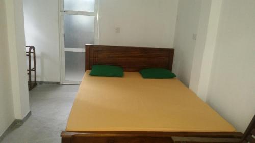Cama ou camas em um quarto em Disa Residence