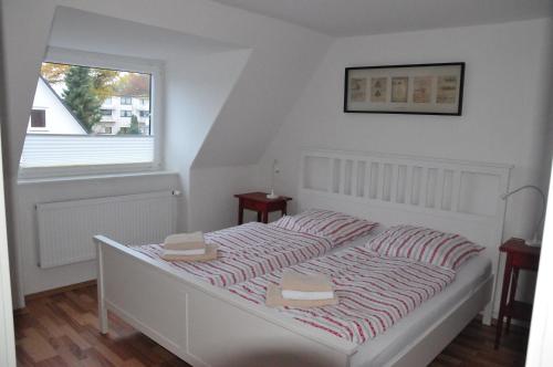 Postel nebo postele na pokoji v ubytování Haus Tesch