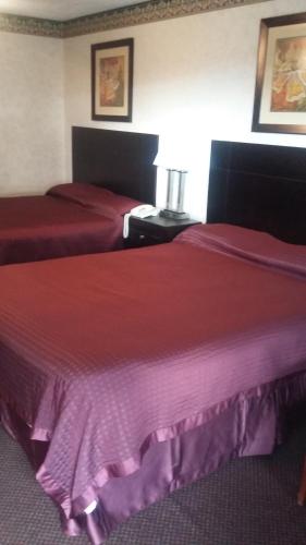 Cama o camas de una habitación en Deer Field Inn