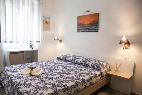 Ένα ή περισσότερα κρεβάτια σε δωμάτιο στο Alta Marea