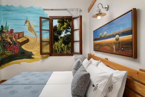 Postel nebo postele na pokoji v ubytování Koukounari luxury villa
