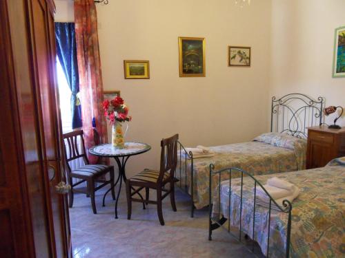 Postel nebo postele na pokoji v ubytování Di mare e di Sale