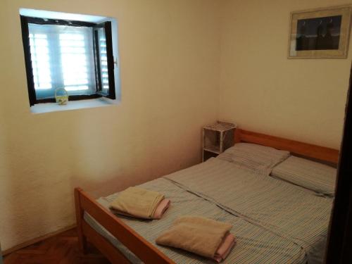 En eller flere senger på et rom på Lili Apartments, Sv Dunata 18