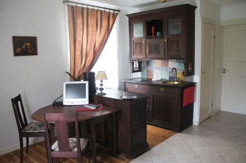 Kuchyň nebo kuchyňský kout v ubytování The Guest Apartment