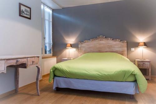 מיטה או מיטות בחדר ב-L'Auberge de Teissières