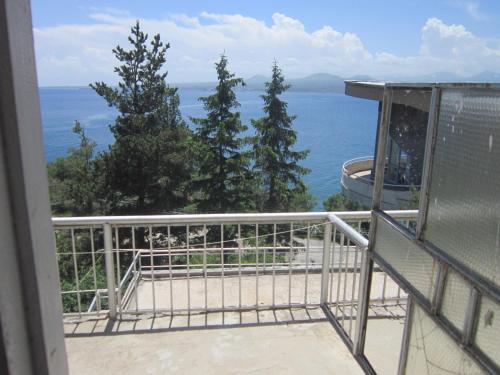 a view of the ocean from the balcony of a house at Sevan Writers House in Sevan